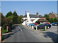 Looking N along Old Chapel Road to the Chequers pub