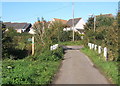 Corner of Church Lane with housing beyond