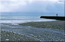 SX9676 : The Dawlish Water runs across the beach by Sarah Charlesworth